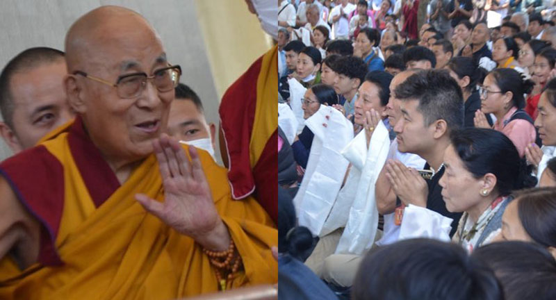 His Holiness the Dalai Lama waves to the crowd gathered to listen to his teachings at the Tsuglakhang in Dharamshala on June 3, 2024.