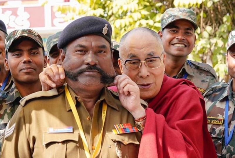 HHDL playfully posing for photos with members of the security team that helped during his four week visit to Bodhgaya, Bihar, India on January 28, 2018. Photo: OHHDL