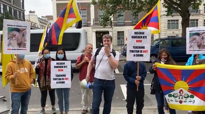 Tibetan activists and supporters gathered outside the Chinese Consulate in London holding a photo of Rinchen Kyi, to mark the Intl. Day of the Disappeared. Photo: File 