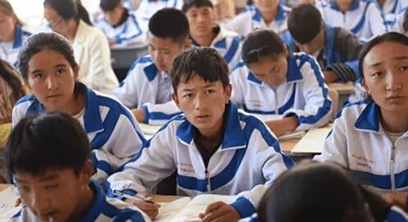 Chinese President Xi personally calling for an increased political education in schools in Tibet to ensure the loyalty of the next generation. Photo: Human Rights Watch