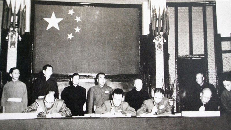After the occupation of eastern Tibet’s provincial capital, Chamdo, the People’s Republic of China (PRC), on 23 May 1951, forced Tibet to sign the 17-point “Agreement on Measures for the Peaceful Liberation of Tibet”. The alternative, the occupying forces said, was immediate military operation in the remaining parts of Tibet. Photo adapted from Claude Arpi exhibition.