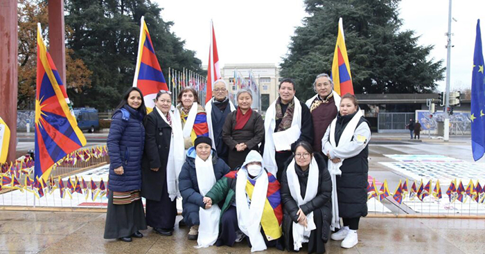 Representative Thinlay Chukki, and Kalden Tsomo of the Tibet Bureau with Tibetan activists in Geneva, December 14, 2022. Photo: Tibet Bureau
