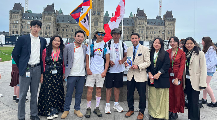 MP Arif Virani with Tibetan activists Sangyal Kyab and Rabga outside the Canadian Parliament, Ottawa, Canada, June 21, 2022. 