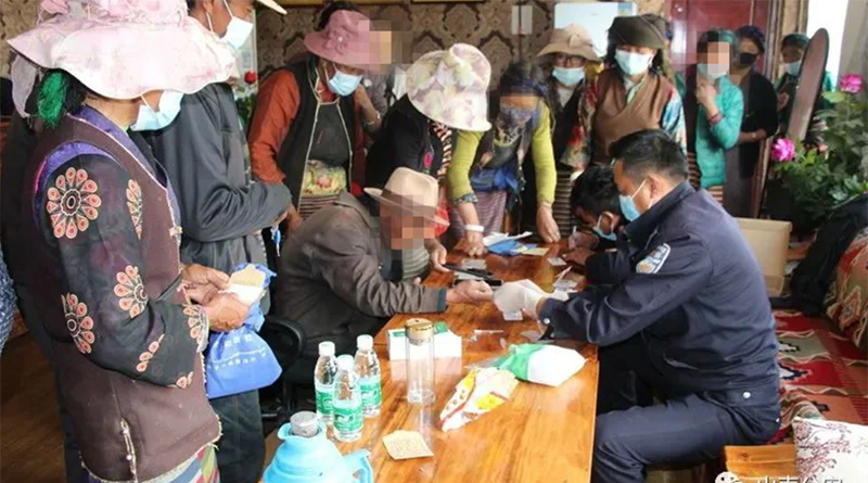 Chinese police collecting DNA from Tibetans in Lhoka Prefecture. Photo: "Lhoka Police Bulletin", Lhoka Public Security, on August 31.2021.