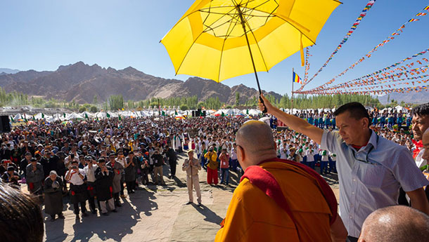 His Holiness the Dalai Lama greeting the crowd of over 25,000 in Leh, Ladakh, J&K, India on July 6, 2018. Photo by Tenzin Choejor