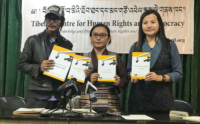 TCRD researcher Pema Gyal (L), Director Tsering Tsomo and researcher Tenzin Dawa (R) at the launch of the annual report during a press conference in Dharamshala, India, on May 7, 2018. Photo: TPI