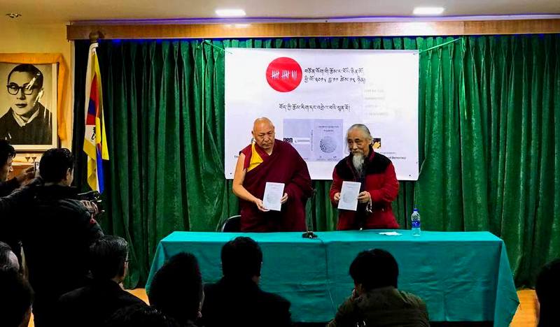 Geshe Lhakdor, Director of Library Of Tibetan Worksand Archives (L) and Mr Tashi Tsering, Director of Amnye Machen Institute (R) releasing the report on November 15, 2018, in Dharamshala, India. Photo: TPI