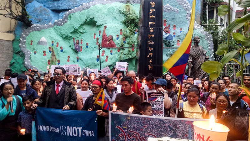 Tibetans and supporters holding a a candlelight vigil in solidarity with Hong Kongers at the Martyr’s Pillar in McLeod Ganj, India during the evening on August 19, 2019. Photo: TPI/Yangchen Dolma