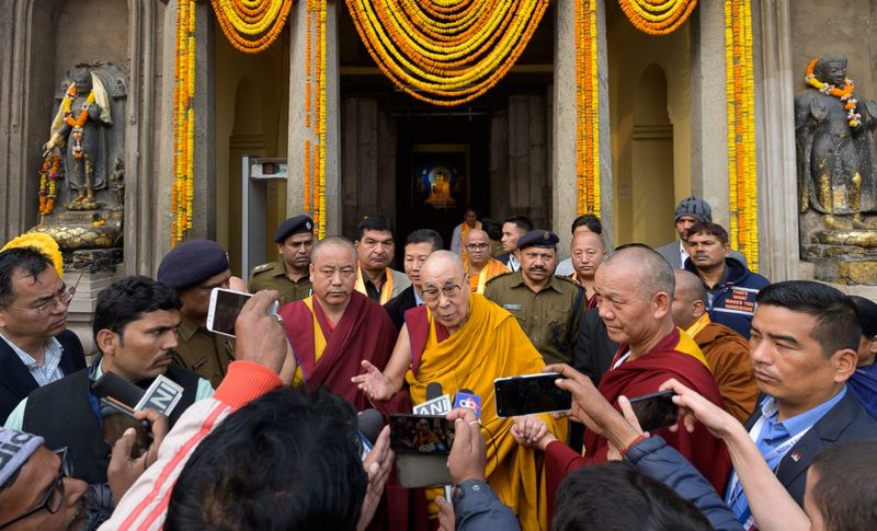 His Holiness speaking to members of the press at the Mahabodhi Stupa in Bodhgaya, Bihar, India on December 25, 2019. Photo by Tenzin Choejor