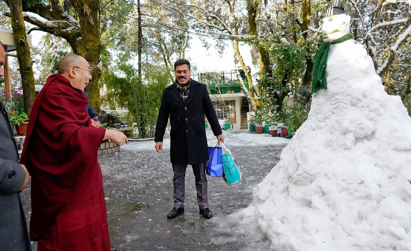 His Holiness the Dalai Lama pleased to see a snowman in the driveway of his residence in Dharamsala, HP, India on February 8, 2019. Photo by Ven Tenzin Jamphel