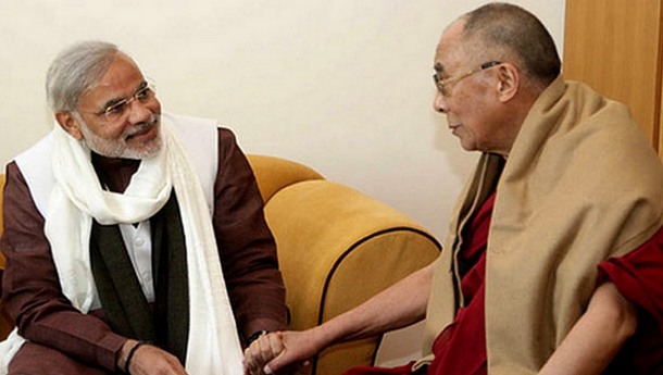 His Holiness the Dalai Lama with Narendra Modi. Photo: File